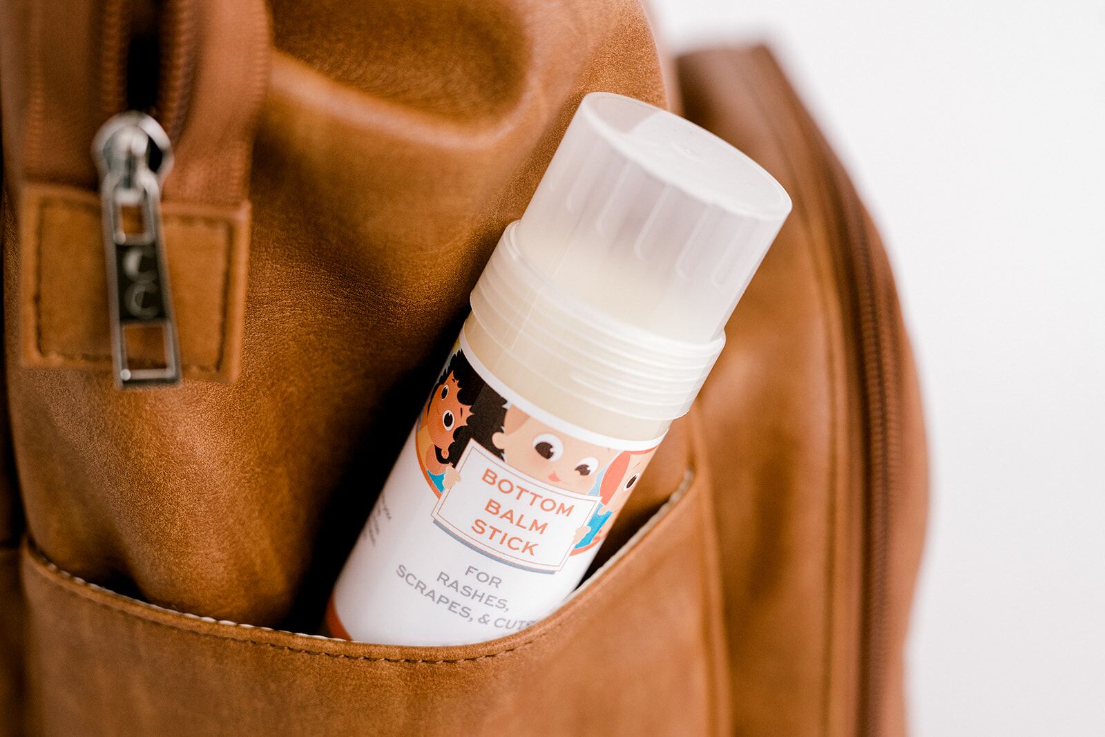A roll of baby balm in the bag